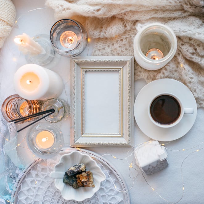 Candles, Coffee and Blank Frame on White Background